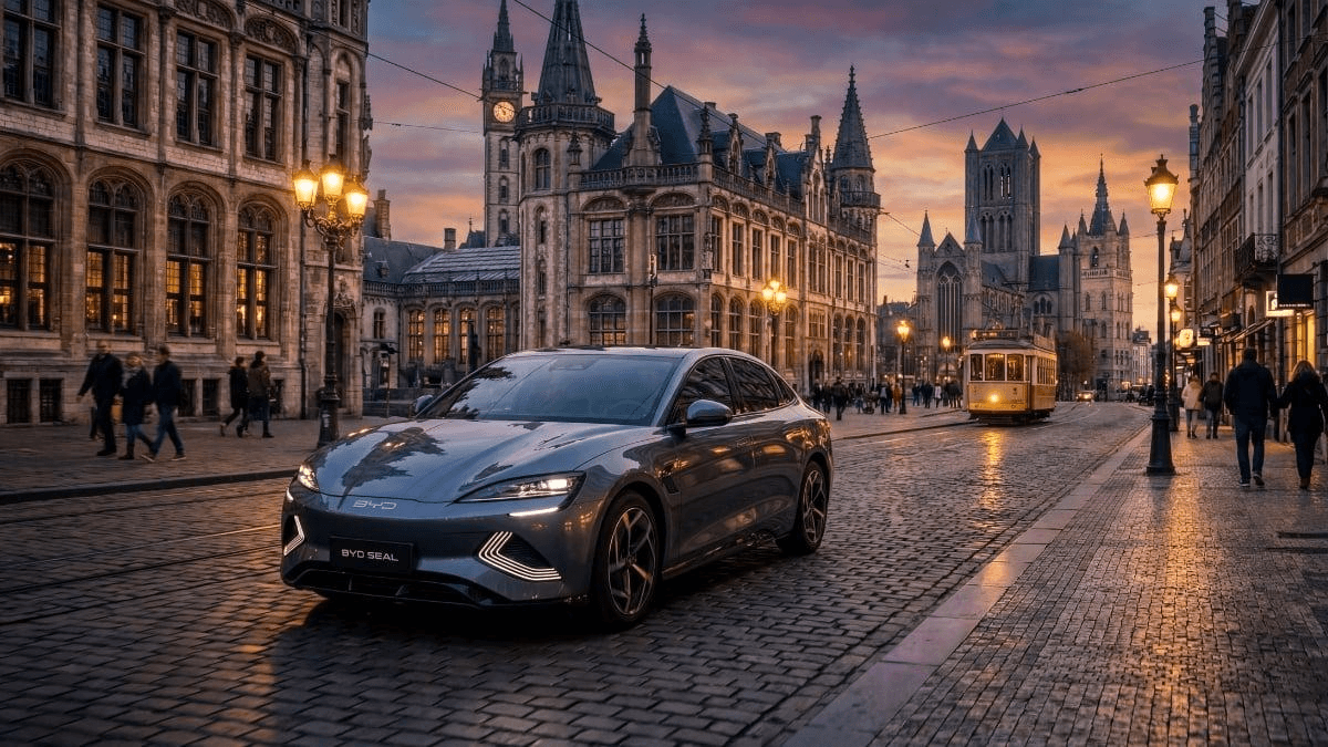 A BYD sedan on a European city street at dusk